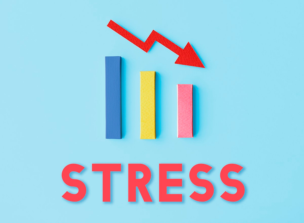 Image of a decreasing bar graph with the word Stress on it - Top 5 Reasons People Should Read Daily