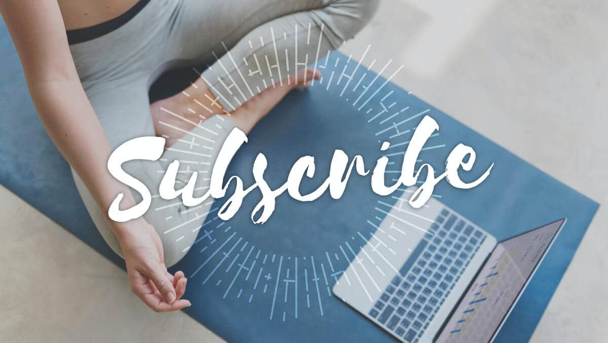 partial image of a girl sitting across from a laptop with the word "Subscribe" on the image - after publishing your new blog post
