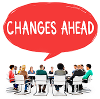 Round table of people with a callout "Changes Ahead" - Overcome Your Fear Of Change