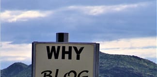 The missing image is that of a sign on top of a hill that says "Why Blog?"