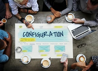 Overhead view of employees around a Configuration design chart - setting up WordPress