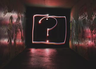 question mark in a darkish room - Have You Figured Out What Your "WHY" Is Yet?