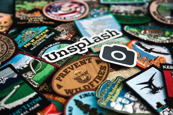 Lots of badges with "Unsplash" on the top