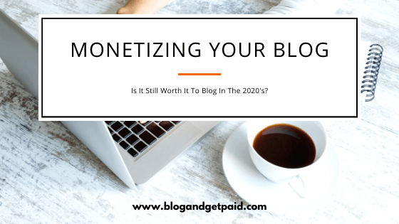 Image of a laptop and cup of coffee over which it's written "Monetizing Your Blog - Is it still worth it to blog"