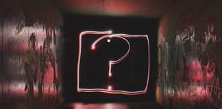question mark in a darkish room - Have You Figured Out What Your "WHY" Is Yet?