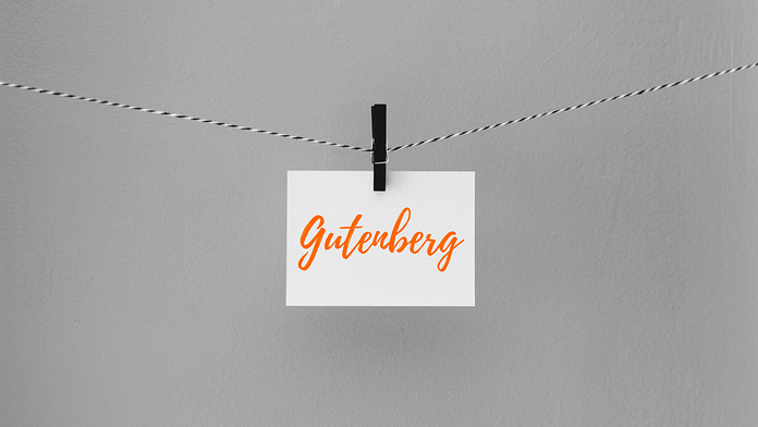 Grey background with white post it note with "Gutenberg" on it