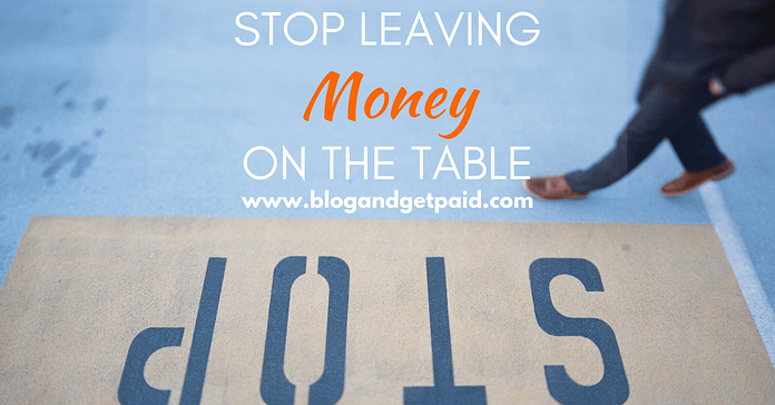 The image shows an inverted STOP sign and a man crossing the street. In the foreground, the words Stop leaving money on the table are written